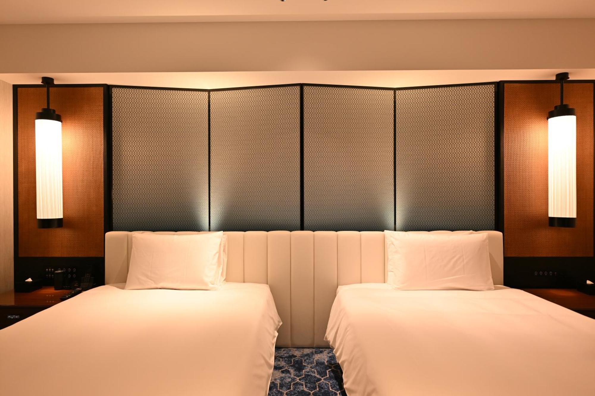Ryukyu Hotel & Resort Nashiro Beach Itoman Exterior photo A room at the hotel